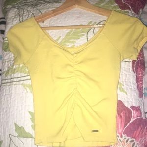 A yellow crop top